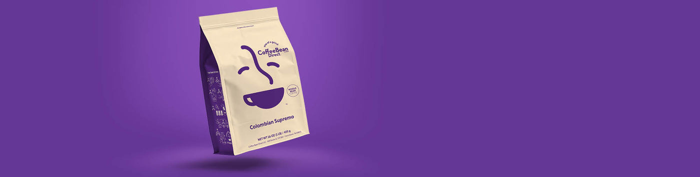 New Face Same Taste featured hero -- bag of rebrand Coffee Bean Direct Colombian Supremo coffee on a purple background