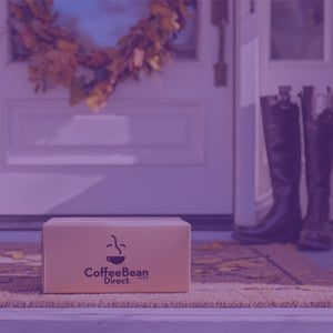 10% Subscription Discount Upgrade featured mobile hero -- Coffee Bean Direct delivery box on a porch with an Autumn background