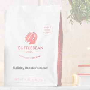 Holiday Roaster's Blend featured mobile hero -- Holiday Roaster's Blend coffee bag next to books and Christmas lights