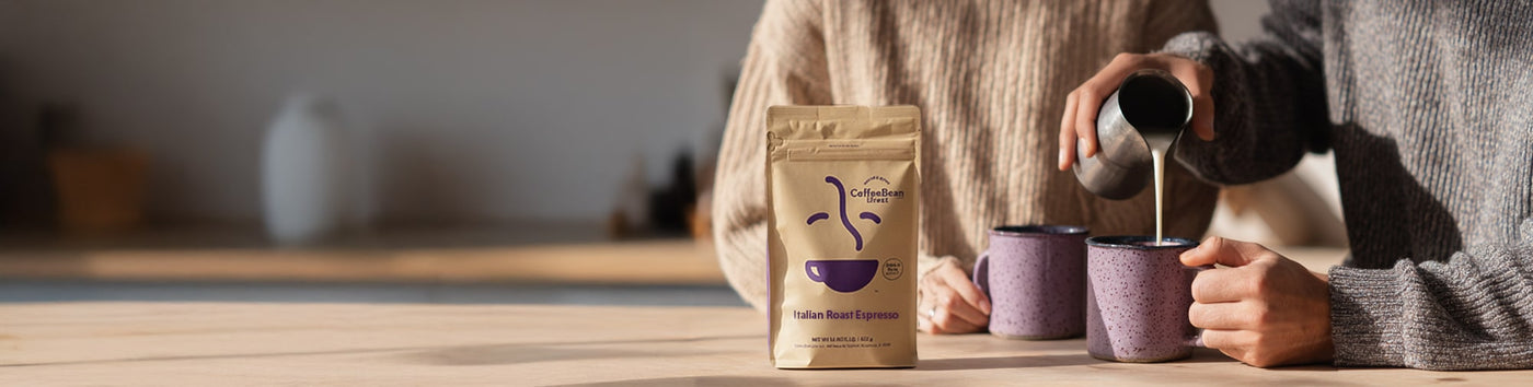 Espresso Subscription featured hero -- 
Person pouring milk into their coffee mug alongside a bag of our Italian Roast Espresso