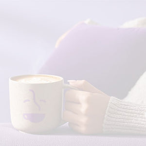 Subscription landing page mobile hero -- person holding a branded coffee mug with a latte 